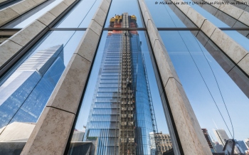 10 Hudson Yards and 30 Hudson Yards reflected on the east facade of 35 Hudson Yards (unretouched)