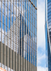 Reflection of 10 Hudson Yards on the south facade of 35 Hudson Yards